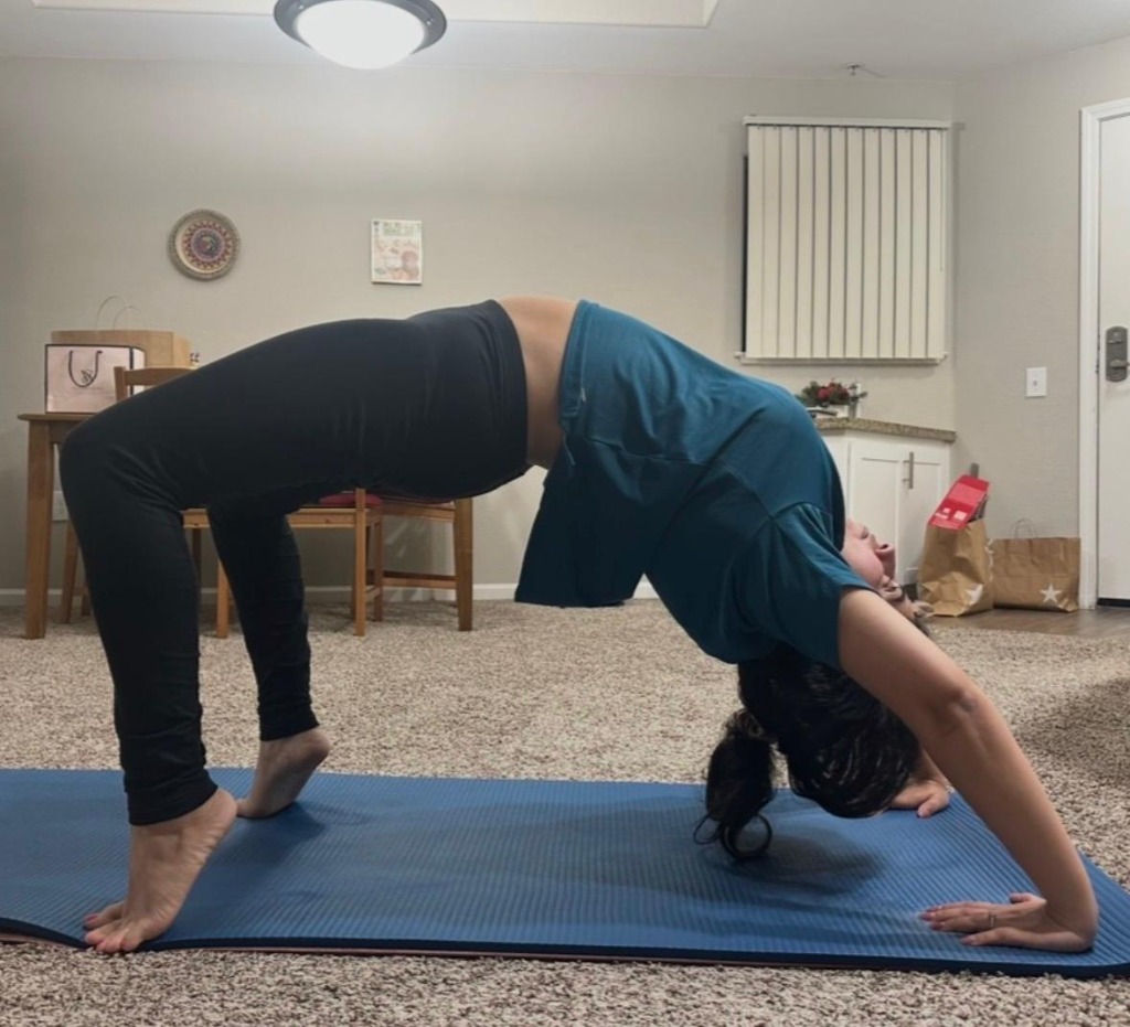 Sampada doing a yoga pose